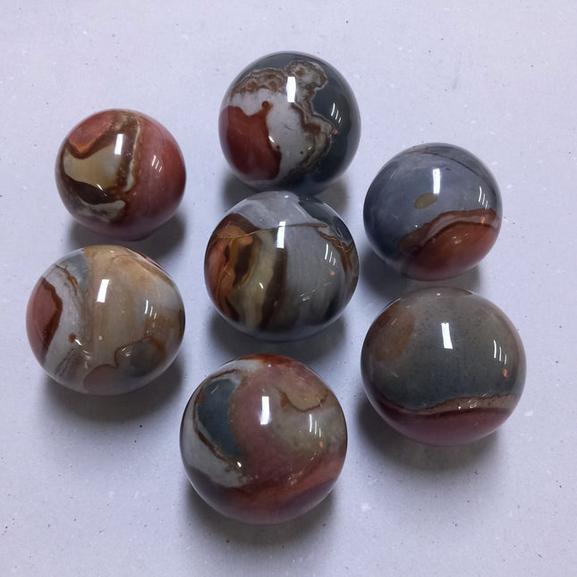 Polychroom jaspis geslepen bollen per kilo