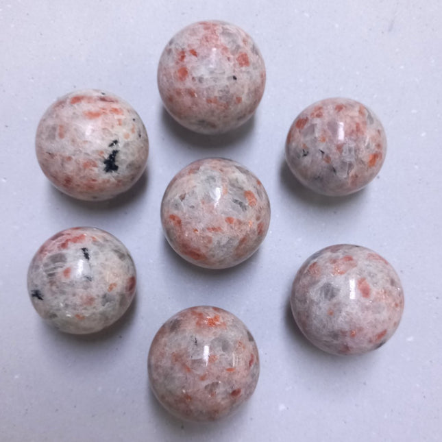 Zonnesteen geslepen bollen per kilo